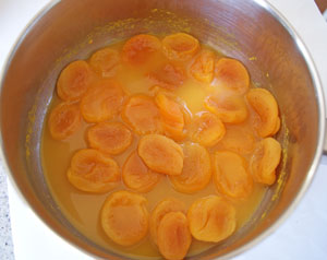 simmering dried apricots and orange juice