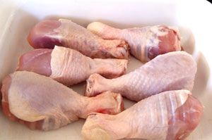 chicken legs ready for baking