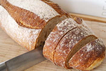 Cutting sourdough loaf for bruschetta