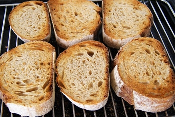 grilling bread slices for bruschetta