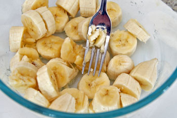 mashing banana for bread