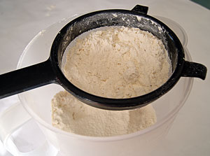 sifting flour for buttermilk pancakes