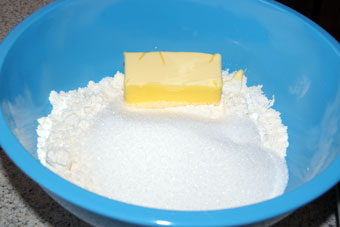 cutting the butter into the flour for muffins