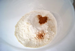 sifting flour for lemon poppyseed muffins