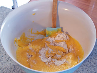 fold pumpkin through flour