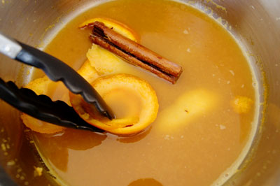 reduce poaching liquid and remove lemon and orange rind