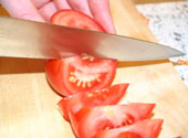 chopping tomatoes