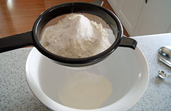 sifting flour for banana muffins