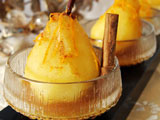 poached pears in a spicy orange ginger sauce