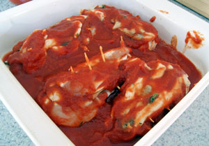 stuffed chicken in pan with sauce3