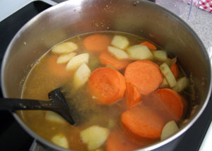 add the chicken stock and stir