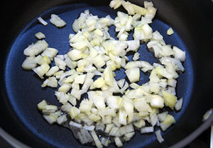 frying the onions for vegetable casserole