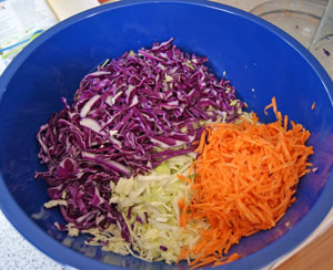 shredded cabbage and carrot ready for coleslaw