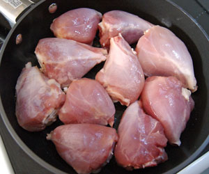 chicken in pan for cacciatore