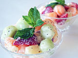 bowl of fruit salad with poppyseed dressing