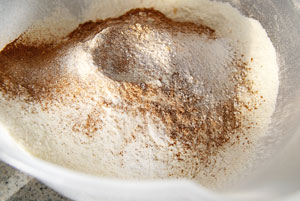 sifting flour for carrot cake