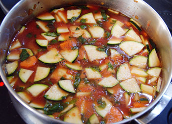 Italian vegetable soup cooking in a pot