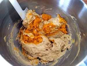 stirring pumpkin puree